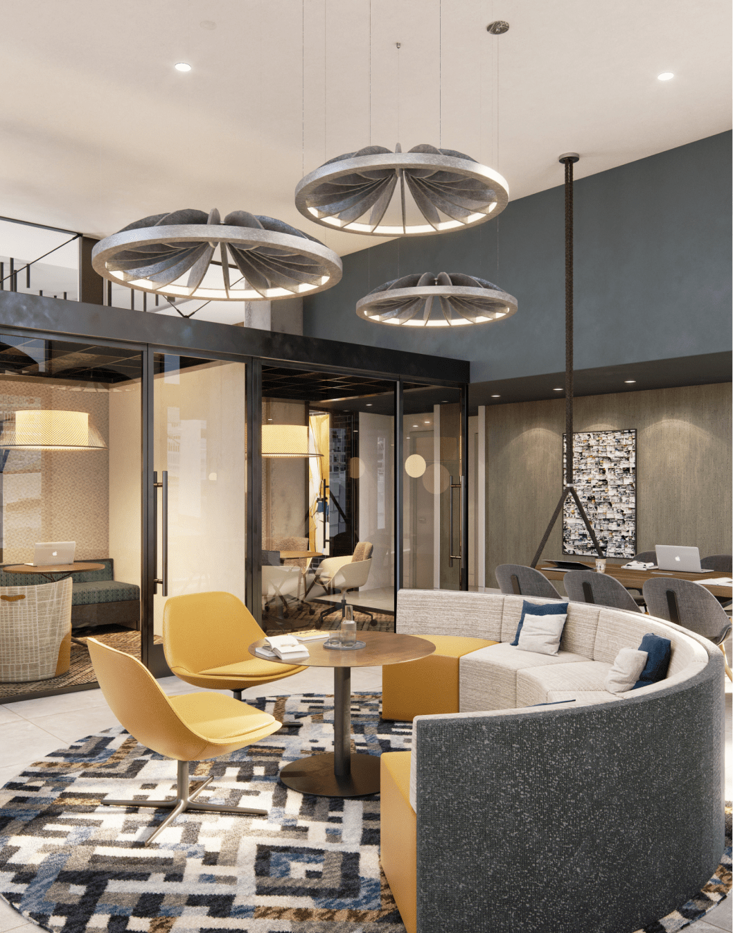 A modern office lobby & coworking space with a circular seating area. One of the top-notch amenities at Elle's DC apartments.